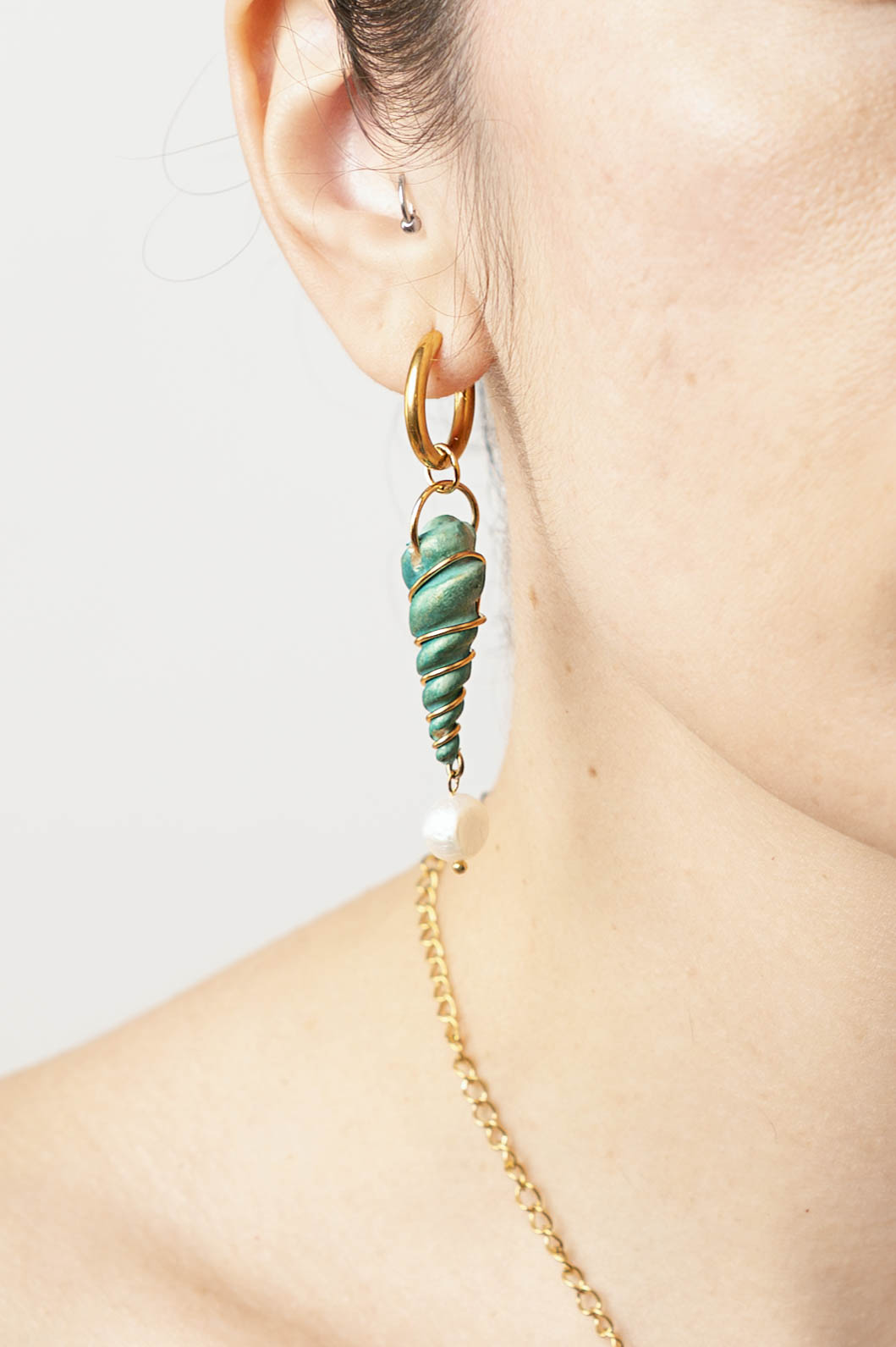 Concha verde con perla de agua dulce