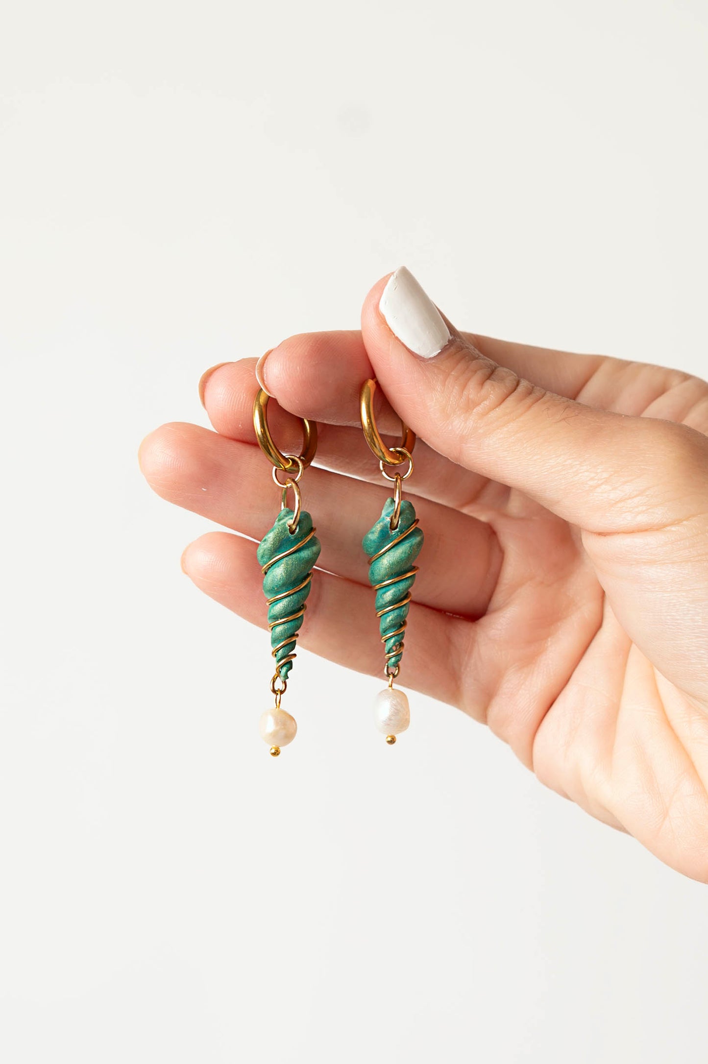 Concha verde con perla de agua dulce